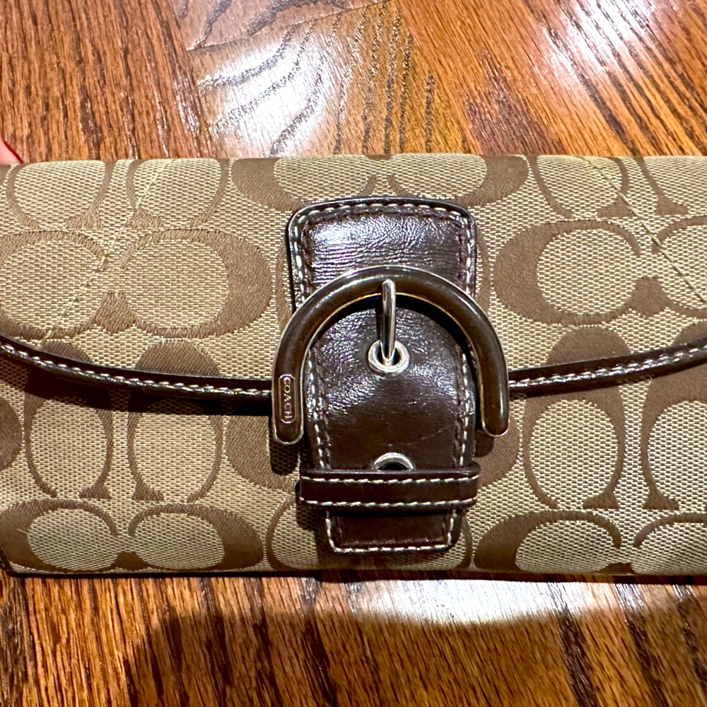 Coach authentic brown wallet with buckle